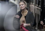 Amber Heard had bruises and burns when with Johnny Depp, sister tells court