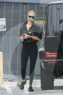 PREMIUM EXCLUSIVE Rosie Huntington-Whiteley looks amazing in black tights