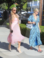 PREMIUM EXCLUSIVE Paris Hilton Dons Pink Kitty Cat Mask To Match Her Lovely Dress