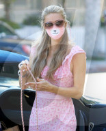 PREMIUM EXCLUSIVE Paris Hilton Dons Pink Kitty Cat Mask To Match Her Lovely Dress