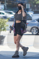 Singer-songwriter Charlotte Aitchison, aka Charli XCX, is seen leaving a gas station after buying cigarettes and water. 