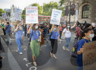 NHS workers march to Downing Street to demand a pay rise.