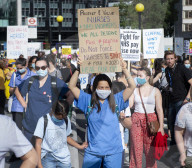 NHS workers march to Downing Street to demand a pay rise.