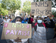 NHS workers march to Downing Street to demand a pay rise.