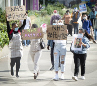NHS workers march to Downing Street to demand a pay rise.
