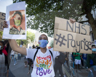 NHS workers march to Downing Street to demand a pay rise.