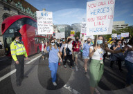 NHS workers march to Downing Street to demand a pay rise.