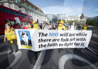 NHS workers march to Downing Street to demand a pay rise.