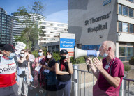 NHS workers march to Downing Street to demand a pay rise.