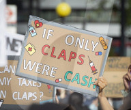 NHS workers march to Downing Street to demand a pay rise.