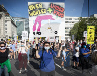 NHS workers march to Downing Street to demand a pay rise.