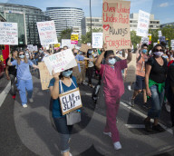 NHS workers march to Downing Street to demand a pay rise.
