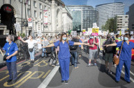 NHS workers march to Downing Street to demand a pay rise.