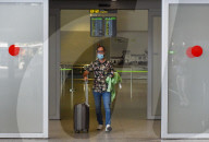 EU travel quarantine restrictions - travellers at Malaga airport 