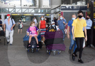 EU travel quarantine restrictions - travellers at Malaga airport 