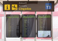 EU travel quarantine restrictions - travellers at Malaga airport 