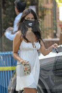 Eiza Gonzalez shows off her fabulous figure in a mini spaghetti strap dress whilst picking up coffee in West LA. 