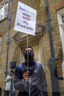 Students protest in front of the Dept of Education in London the A Level results where 39.1% had their marks marked down by an algorithm.  