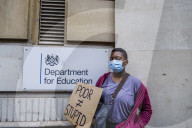 Students protest in front of the Dept of Education in London the A Level results where 39.1% had their marks marked down by an algorithm.  