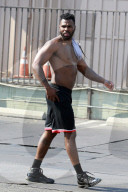 Jason Derulo shows off his toned torso as he leaves a private gym in Los Angeles following a grueling two-hour workout.