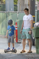 Chris Pratt is every inch the doting dad as he takes his son Jack for a hands free electric scooter ride.