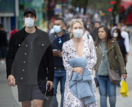 Shoppers in Oxford Street, London wear face coverings whilst shopping during the Covid-19 pandemic