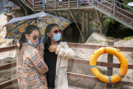Tourists visit Tiger Leaping Gorge during high water