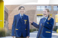 Year 7 pupils arrive for their first day at Eden Park high school.