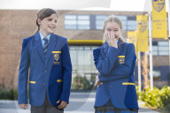 Year 7 pupils arrive for their first day at Eden Park high school.
