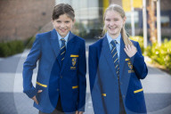 Year 7 pupils arrive for their first day at Eden Park high school.