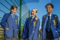 Year 7 pupils arrive for their first day at Eden Park high school.