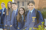 Year 7 pupils arrive for their first day at Eden Park high school.