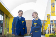 Year 7 pupils arrive for their first day at Eden Park high school.
