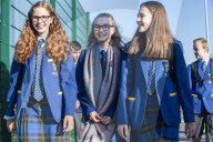 Year 7 pupils arrive for their first day at Eden Park high school.