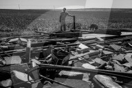 Iowa's farmers count the cost of a rare storm – photo essay. The hurricane-like storm, called a derecho, tore through Iowa this month, damaging buildings and threatening the harvest.