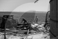 Iowa's farmers count the cost of a rare storm – photo essay. The hurricane-like storm, called a derecho, tore through Iowa this month, damaging buildings and threatening the harvest.