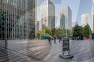 'Trickle not a torrent': workers in Canary Wharf and Manchester return to the office. Suits and takeaway coffees were back out in London’s financial district – but numbers are still lower than normal.