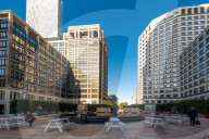 'Trickle not a torrent': workers in Canary Wharf and Manchester return to the office. Suits and takeaway coffees were back out in London’s financial district – but numbers are still lower than normal.