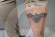 Make mine a Direwolf! The GoT tattoo parlour. Hold the door ... Game of Thrones tattoos. Photograph: Sarah Lee for the Guardian
Shares
31
To celebrate the last season of the fantasy behemoth, superfans have been queuing round the block for free tattoos