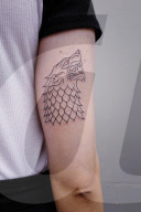Make mine a Direwolf! The GoT tattoo parlour. Hold the door ... Game of Thrones tattoos. Photograph: Sarah Lee for the Guardian
Shares
31
To celebrate the last season of the fantasy behemoth, superfans have been queuing round the block for free tattoos