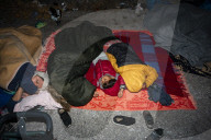 Migrants flee following a fire at Moria camp in Lesvos, Greece - 11 Sept 2020