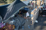 Migrants flee following a fire at Moria camp in Lesvos, Greece - 11 Sept 2020