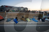 Migrants flee following a fire at Moria camp in Lesvos, Greece - 11 Sept 2020