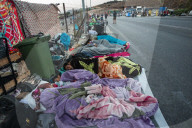 Migrants flee following a fire at Moria camp in Lesvos, Greece - 11 Sept 2020