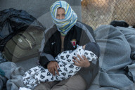 Migrants flee following a fire at Moria camp in Lesvos, Greece - 11 Sept 2020