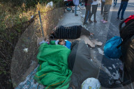 Migrants flee following a fire at Moria camp in Lesvos, Greece - 11 Sept 2020