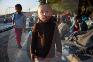 Migrants flee following a fire at Moria camp in Lesvos, Greece - 11 Sept 2020