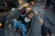 Migrants flee following a fire at Moria camp in Lesvos, Greece - 11 Sept 2020