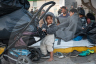 Migrants flee following a fire at Moria camp in Lesvos, Greece - 11 Sept 2020