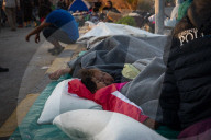 Migrants flee following a fire at Moria camp in Lesvos, Greece - 11 Sept 2020